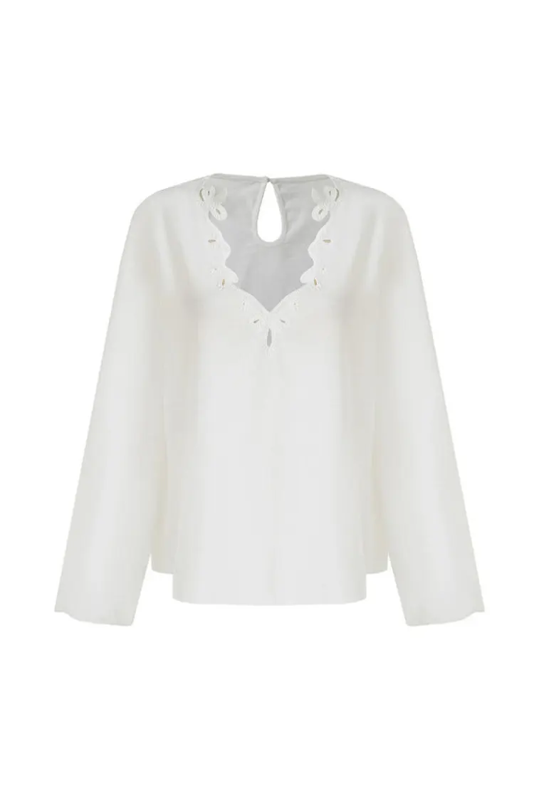 ¿Cómo puede una blusa de fiesta bordada para mujer realzar la moda para ocasiones especiales?