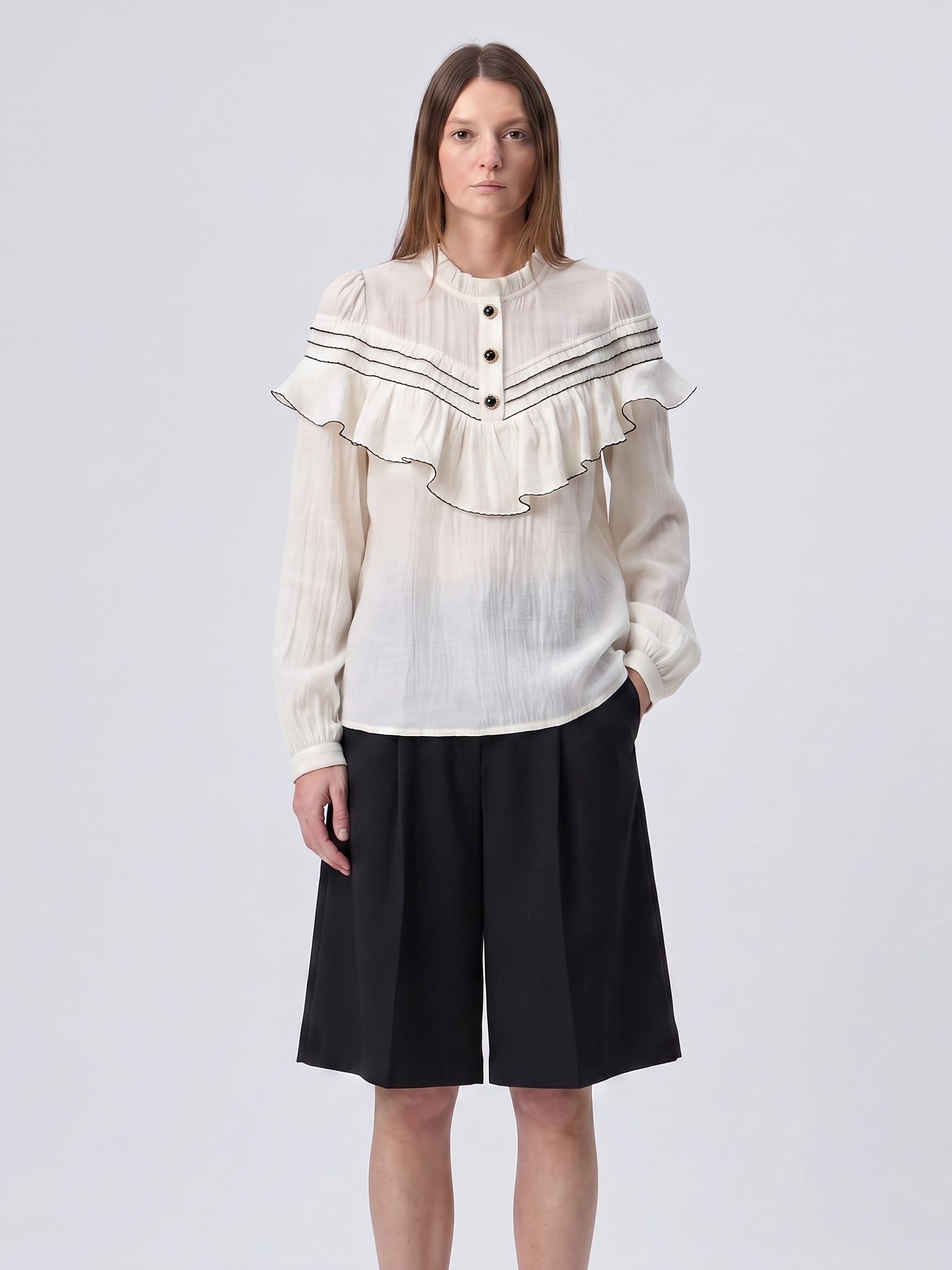 Blusa de mujer de manga larga de lyocell con volantes